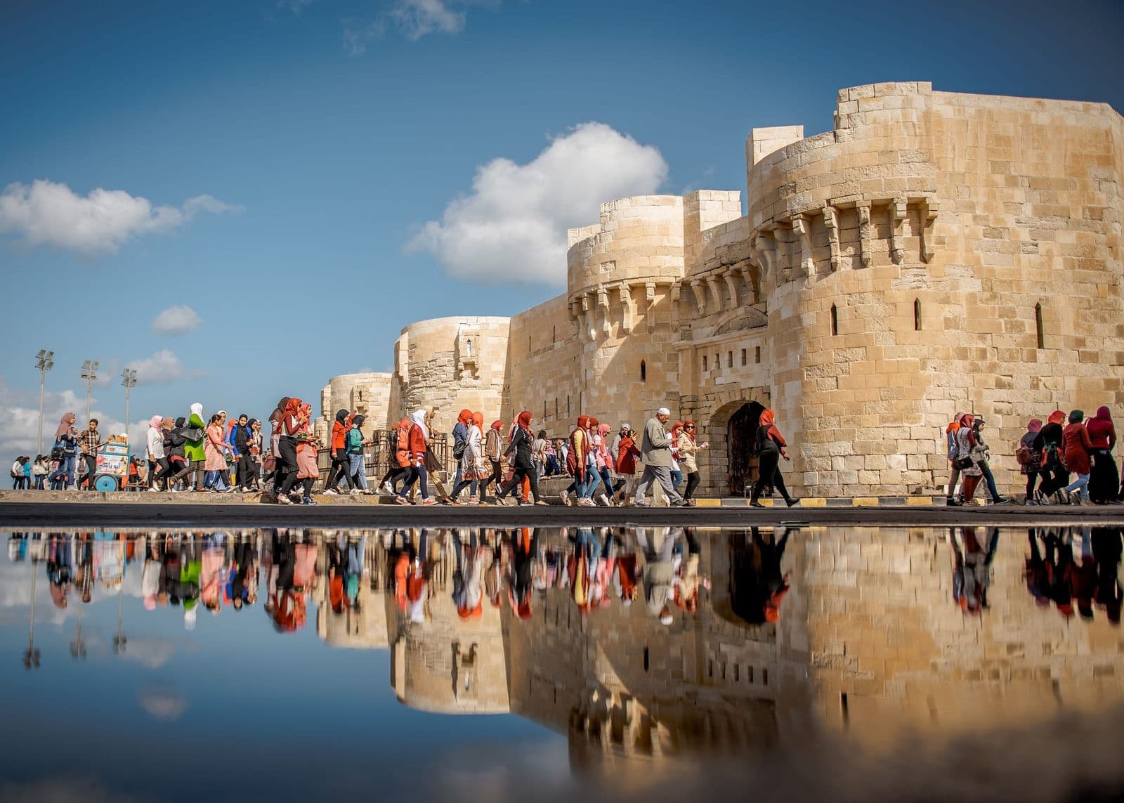 The Citadel of Qaitbay in Alexandria reflected in the water