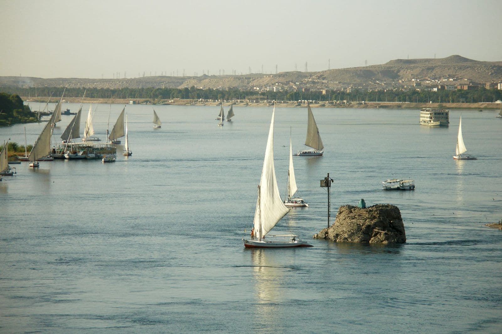 Feluccas sailing between the granite islands of Aswan