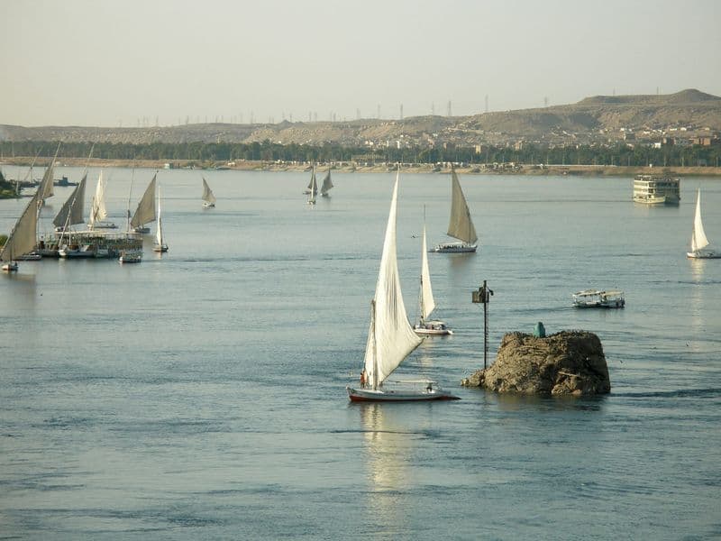Feluccas sailing between the granite islands of Aswan