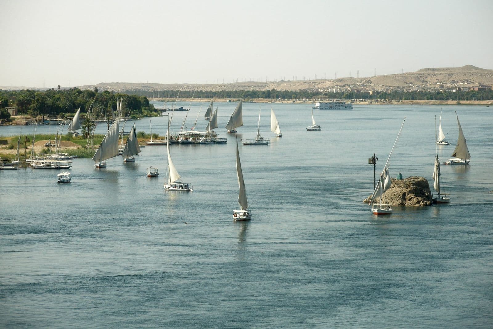 Many feluccas on the wide Nile at Aswan
