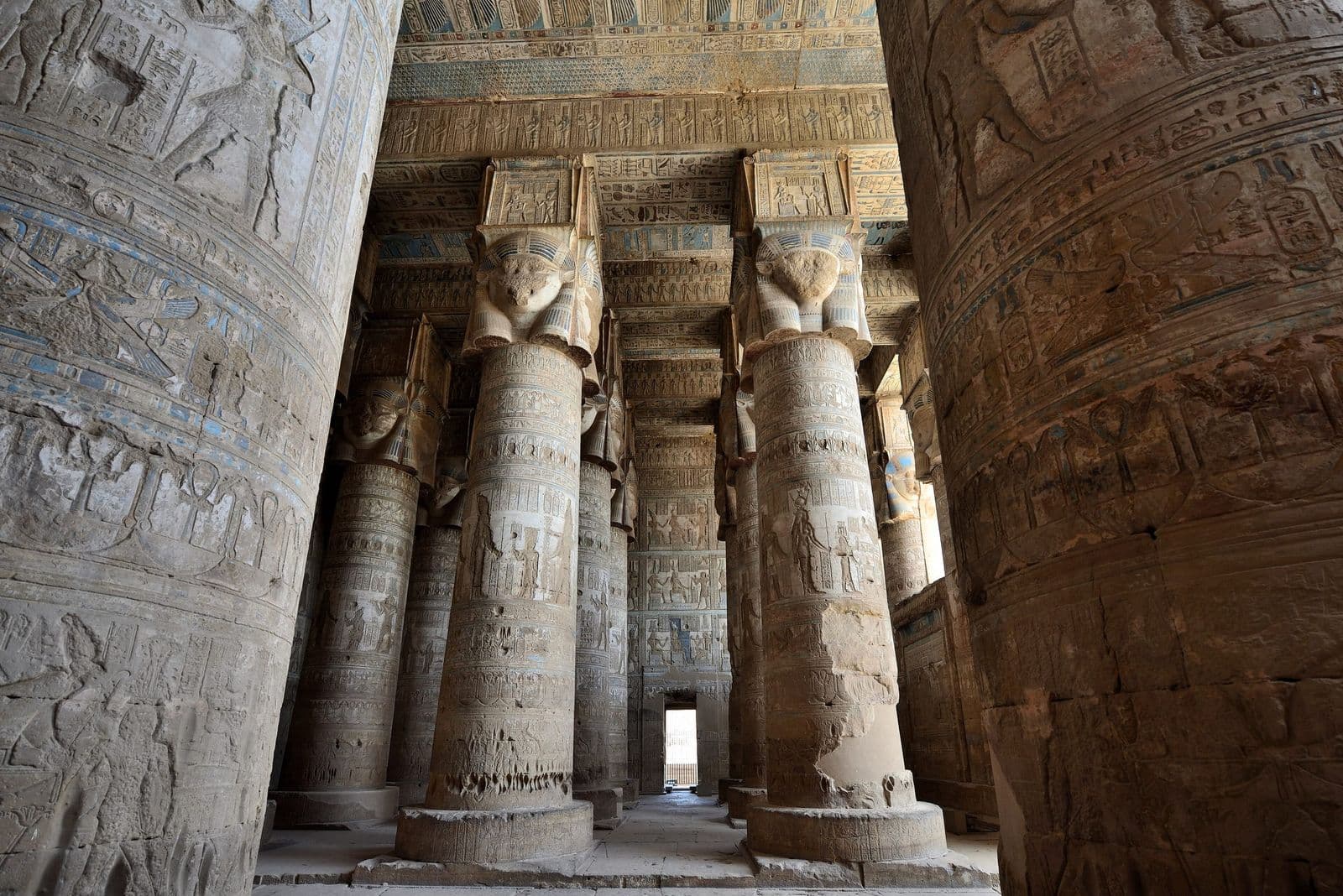 Hathor-headed columns in the hypostyle hall at Dendera