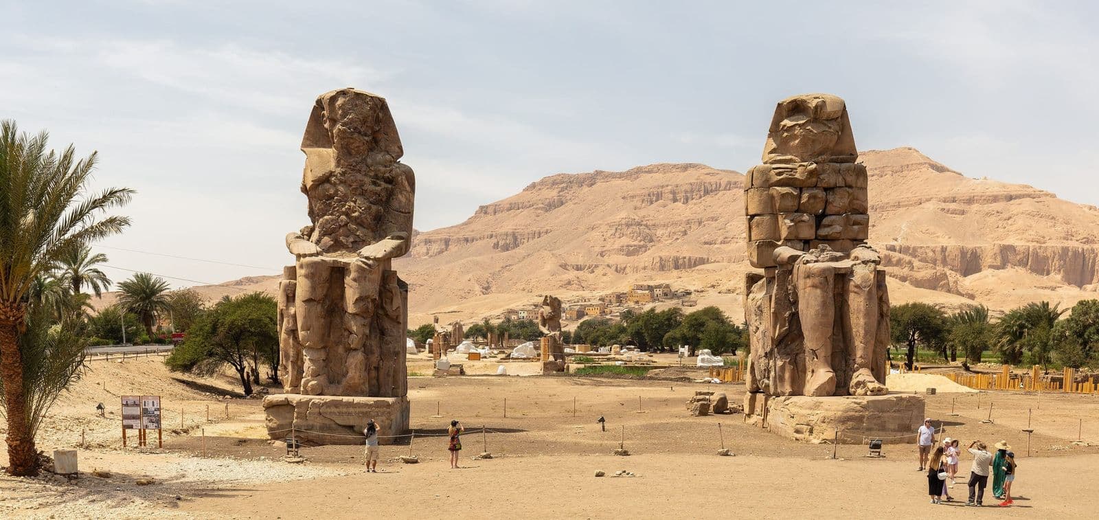 The Colossi of Memnon with the Theban hills behind