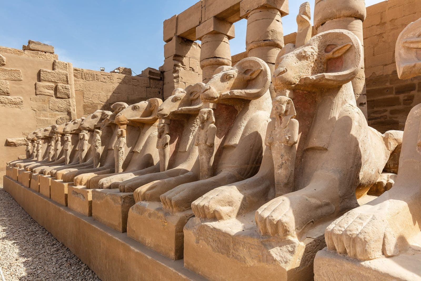 A row of ram-headed sphinxes at Karnak Temple in Luxor