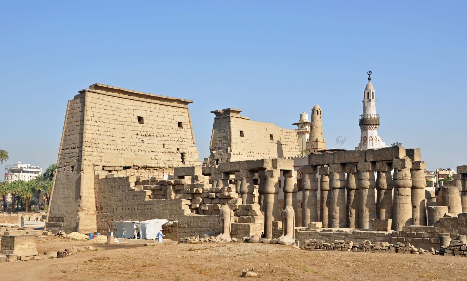 The colonnade and pylon of Luxor Temple in the morning sun