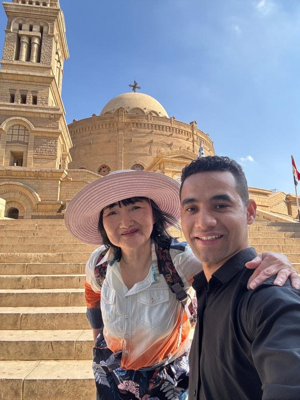 Amr with a traveler at the Church of St George in Coptic Cairo