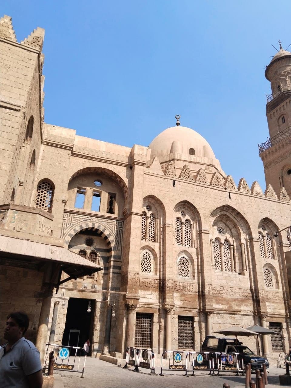 Mamluk domes and carved facades on Al-Muizz Street in Islamic Cairo