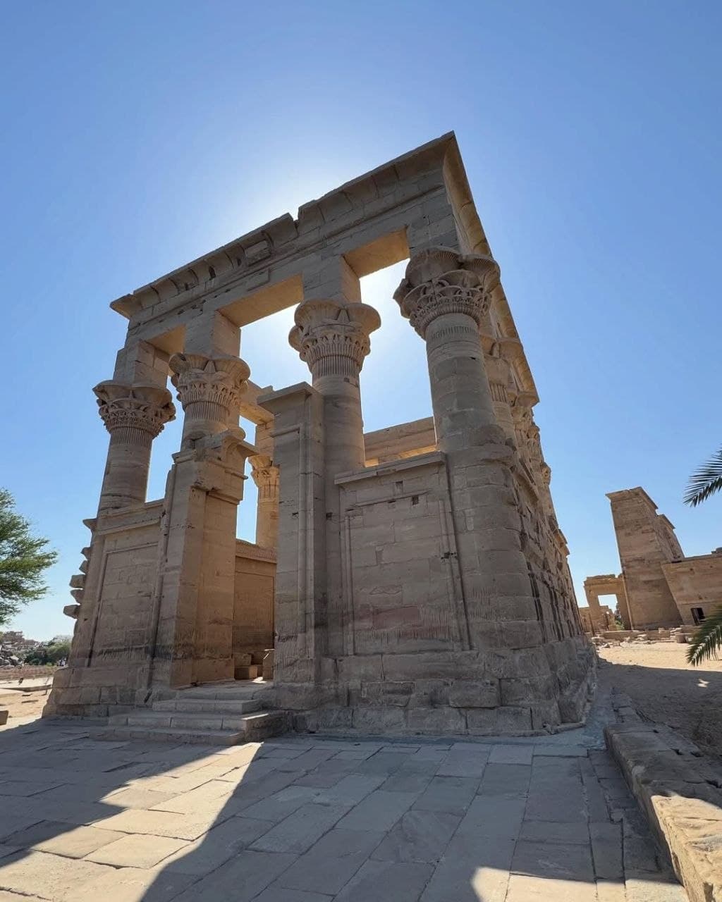 Trajan's Kiosk on Philae Island in Aswan under a clear blue sky