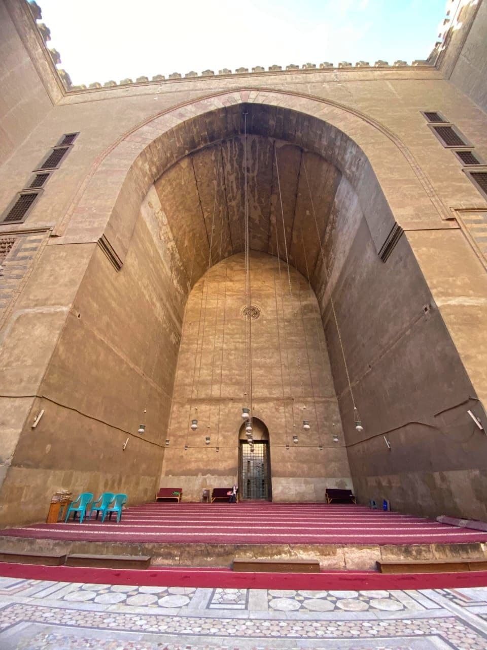 The towering prayer hall arch of the Sultan Hassan Mosque in Cairo