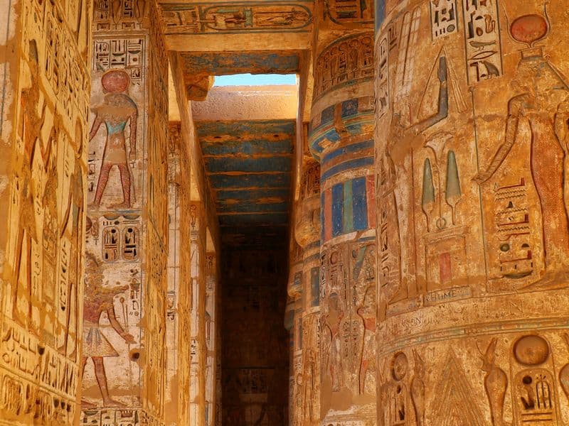 Inside the breathtaking Temple of Dendera. Step into a sanctuary where vibrant ancient colors, majestic Hathor-headed columns, and celestial ceilings have defied time itself.