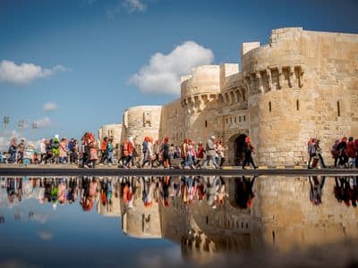 The Citadel of Qaitbay in Alexandria reflected in the water