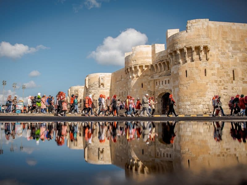 The Citadel of Qaitbay in Alexandria reflected in the water