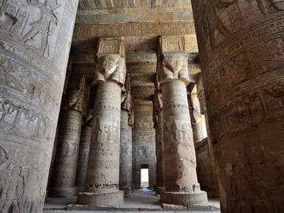 Hathor-headed columns in the hypostyle hall at Dendera