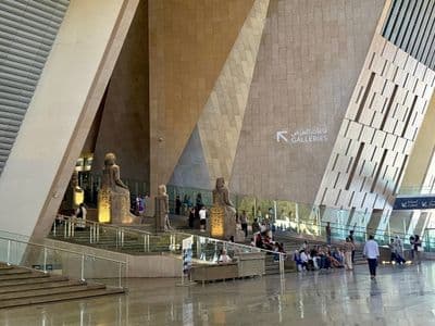 Statues of pharaohs in the Grand Hall of the Grand Egyptian Museum