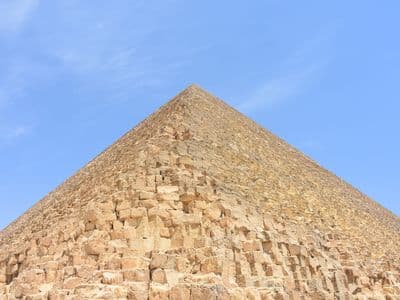 Looking up the limestone blocks of the Great Pyramid of Giza