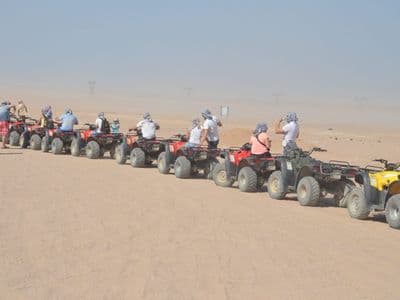 A line of quad bikes ready for a desert safari outside Hurghada