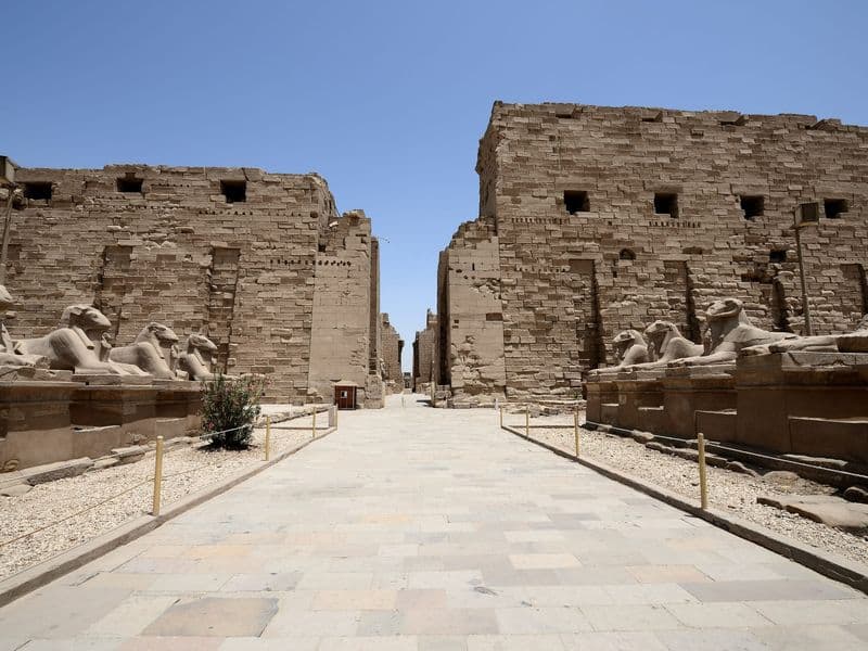 The avenue of ram-headed sphinxes leading to the first pylon of Karnak Temple