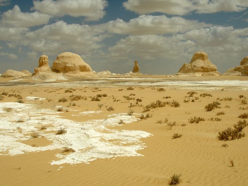 White chalk formations scattered across the White Desert